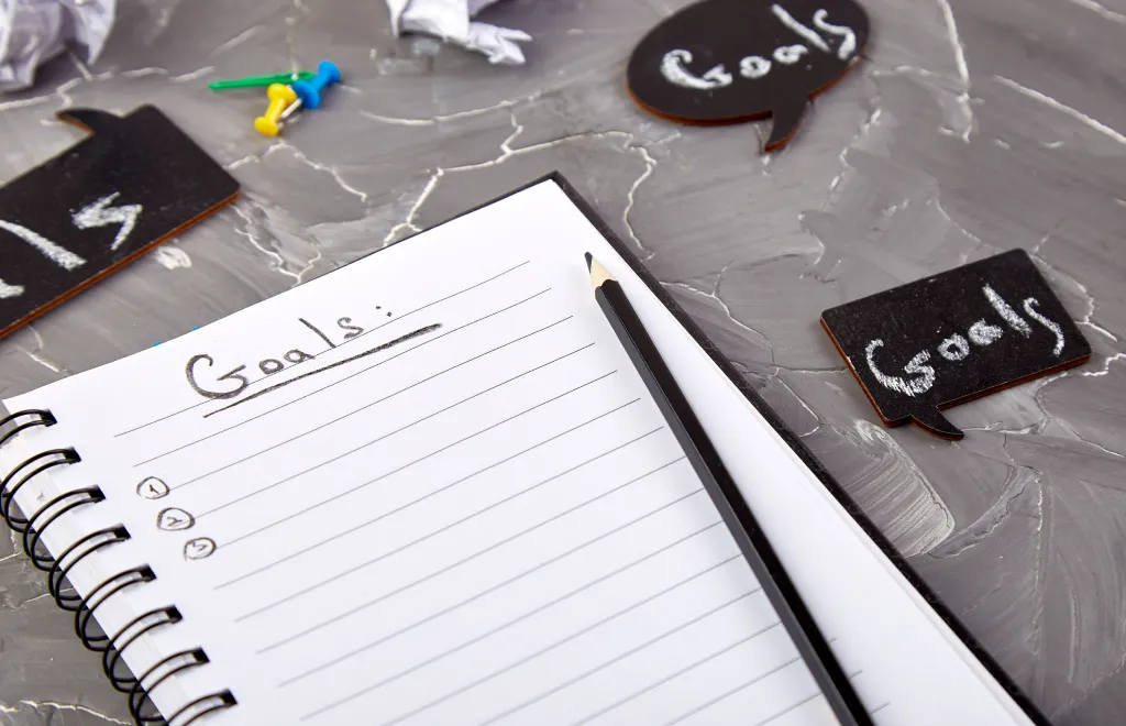defining goals on a notebook