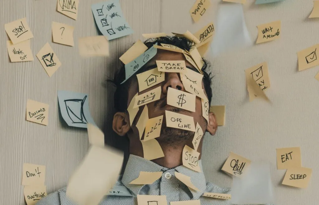 man lost in his notes