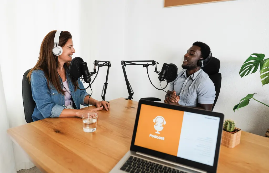 2 people creating a podcast about project management