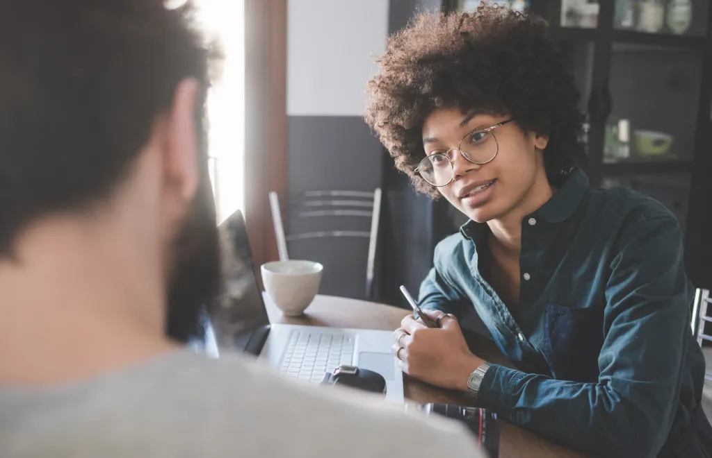 two people talking at work